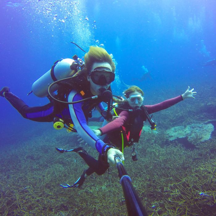 Underwater scuba diving selfie shot with a selfie stick in the Adriatic Sea.